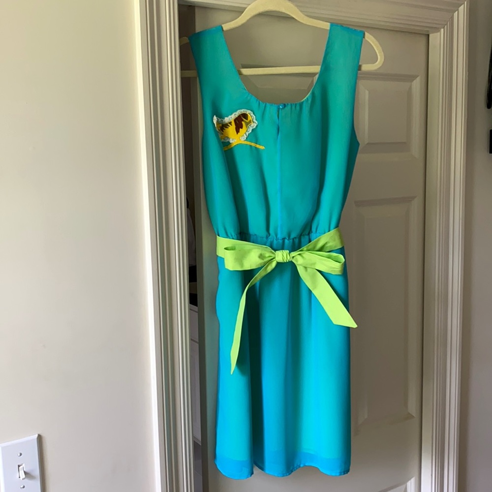 Adorable turquoise and lime dress with bird. Size L